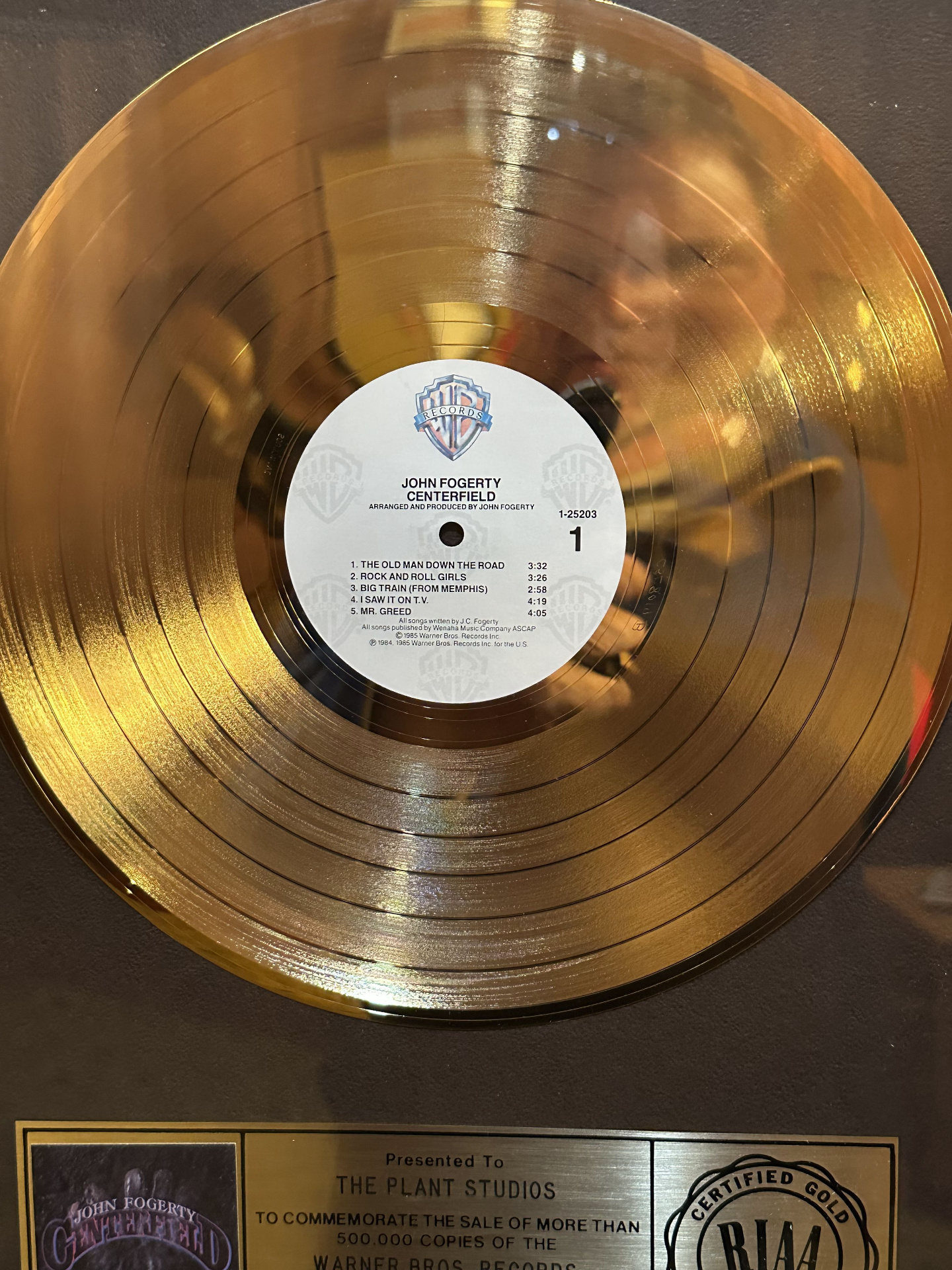 Close-up of the gold record award for John Fogerty's Centerfield, presented to The Plant Studios by Warner Bros. Records in 1985.