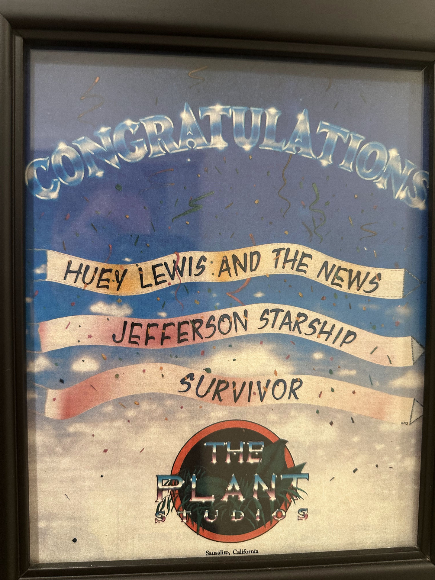 Framed Plant Studios congratulations poster for Huey Lewis and the News, Jefferson Starship, and Survivor.